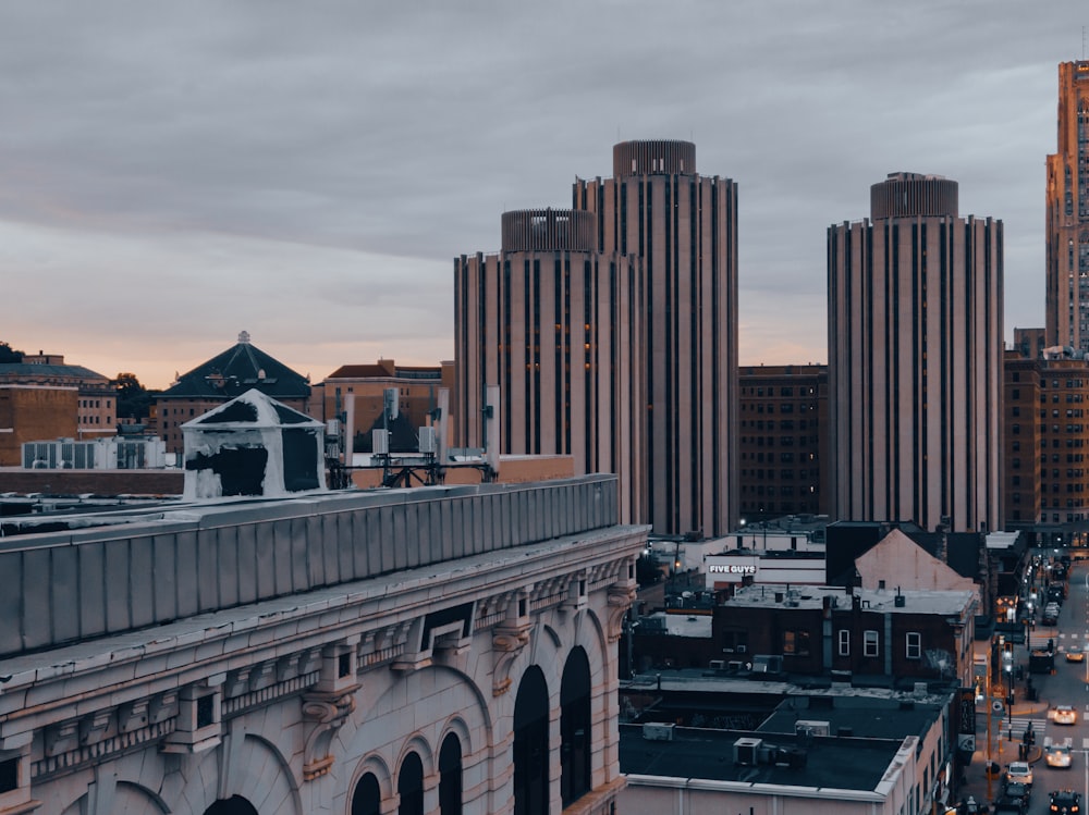 a view of a city with tall buildings