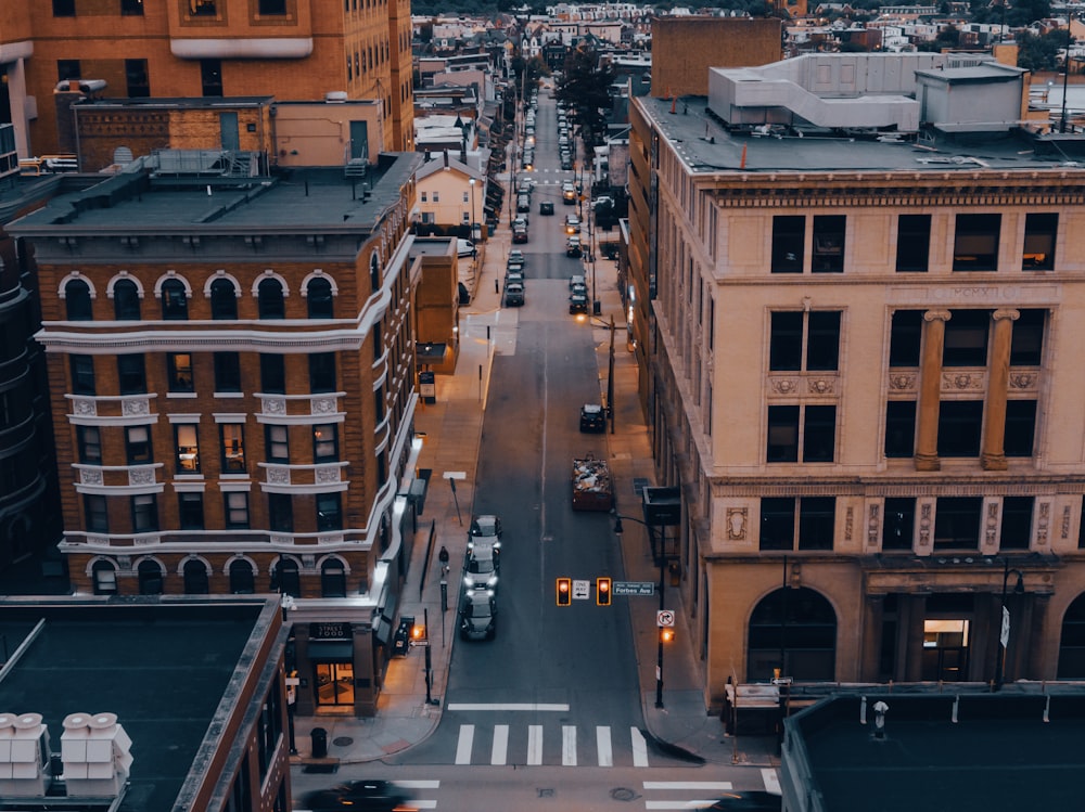 an aerial view of a city street at dusk