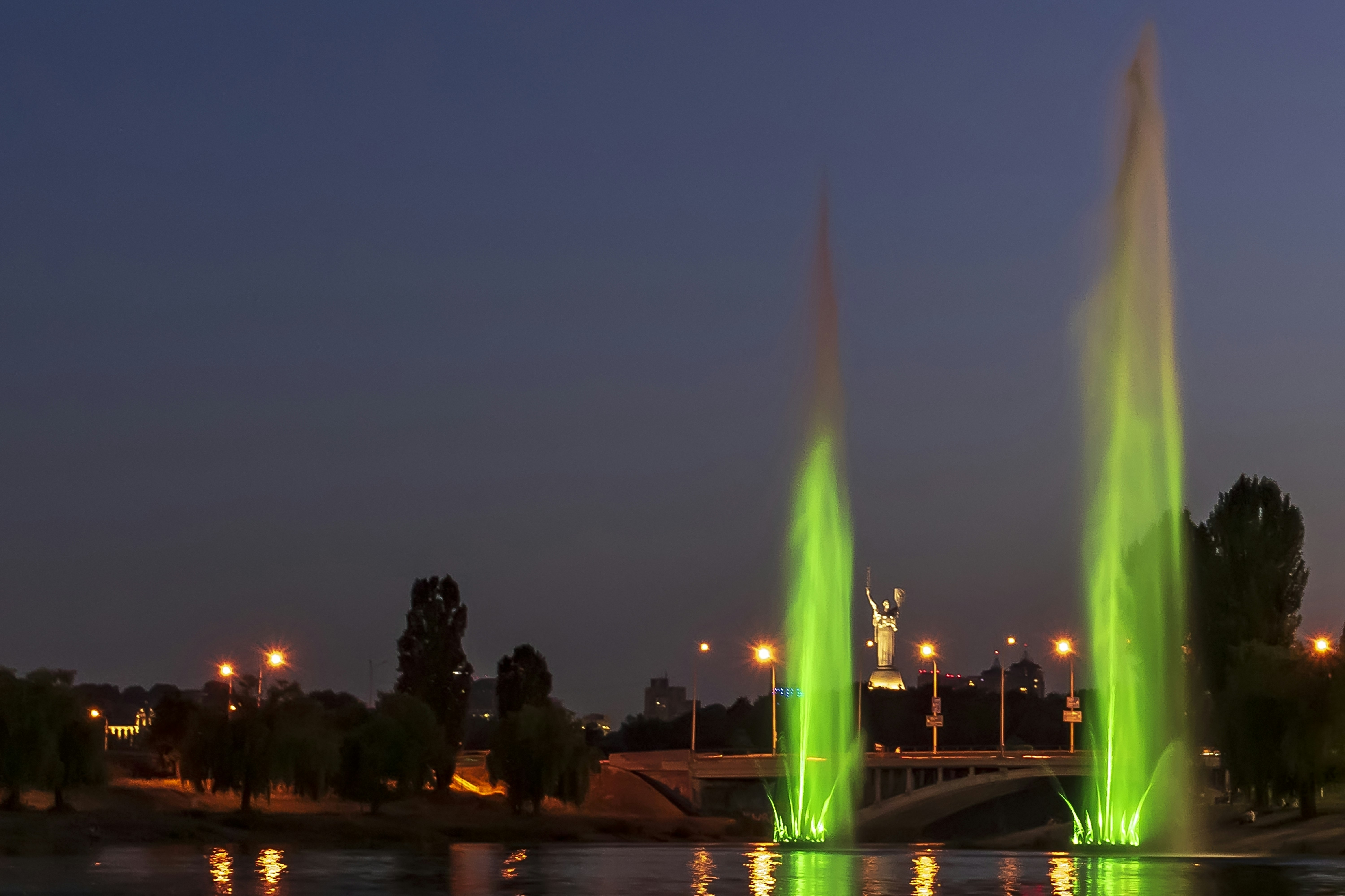 a couple of fountains that are in the water, Every summer in one of the city districts there is a lighting show with the musician fountains. One day I came to watch this lighting show.