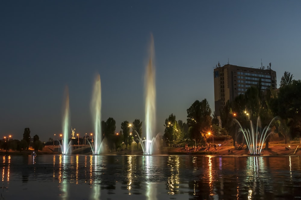 a large body of water filled with lots of fountains