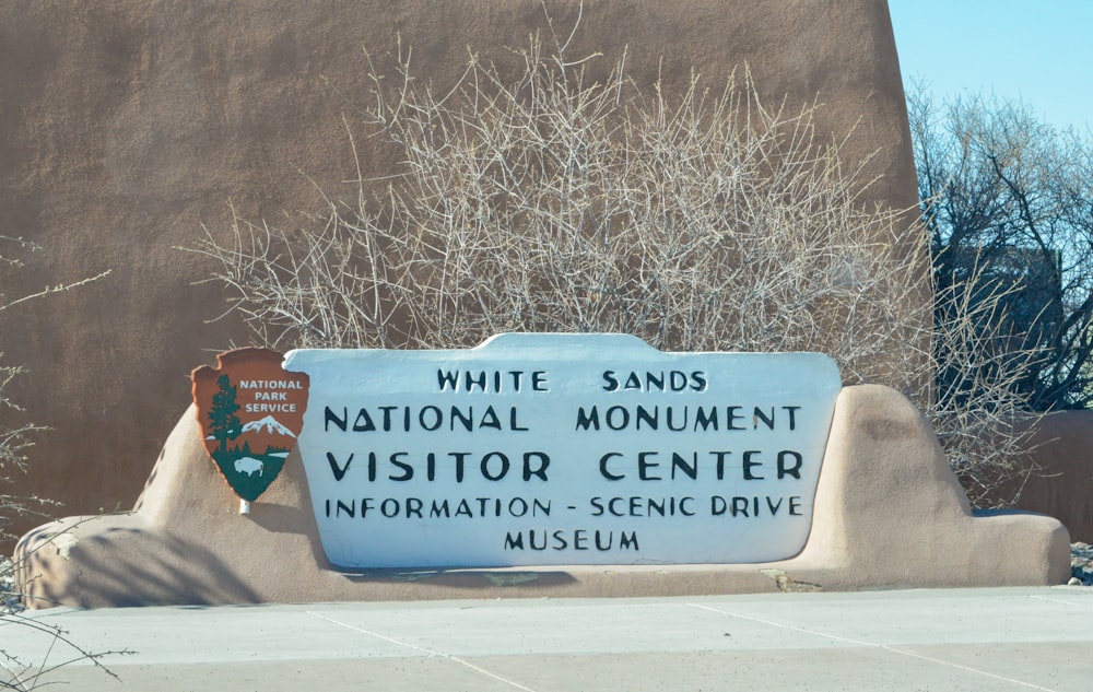 a sign for the national monument visitor center