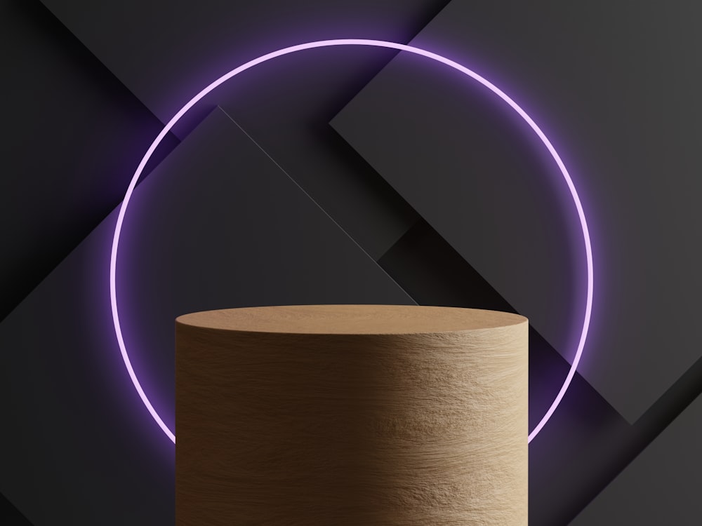 a round wooden table with a purple light around it