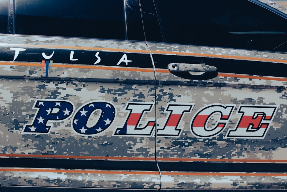 a close up of the side of a police car