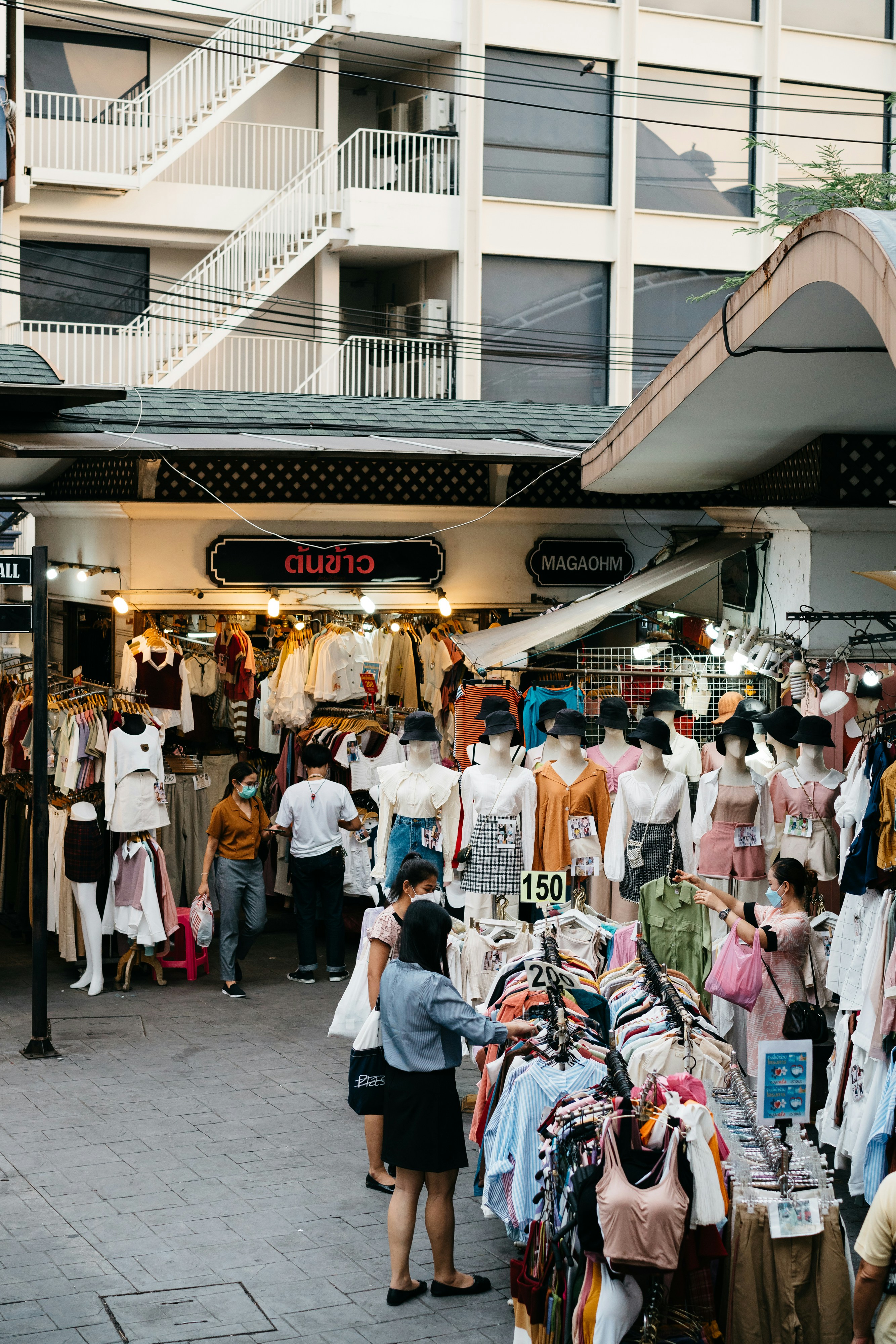 a group of people standing around a store