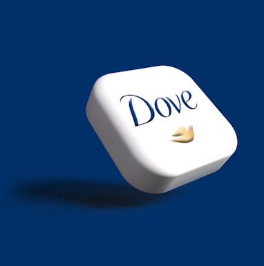 a white dice with the word dove on it