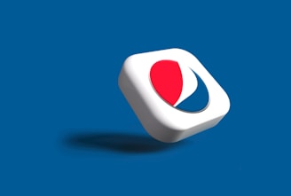 a white and red object on a blue background
