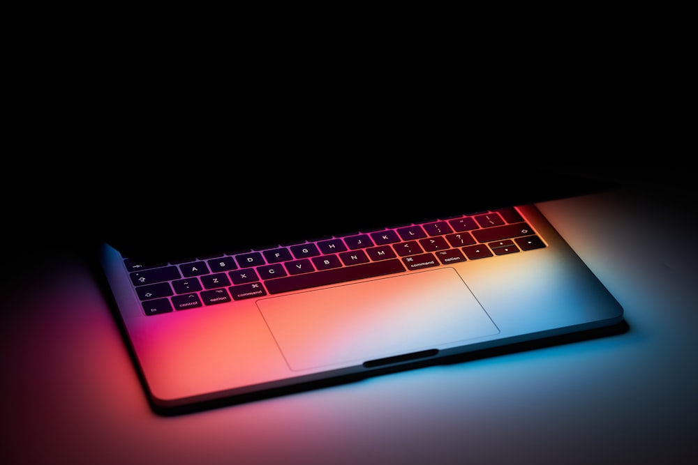 a close up of a laptop with a keyboard