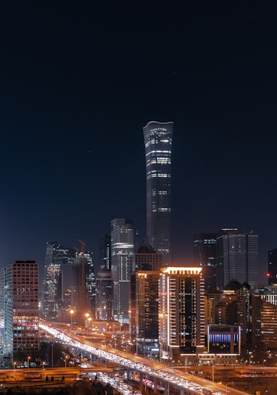 a city at night with a lot of traffic