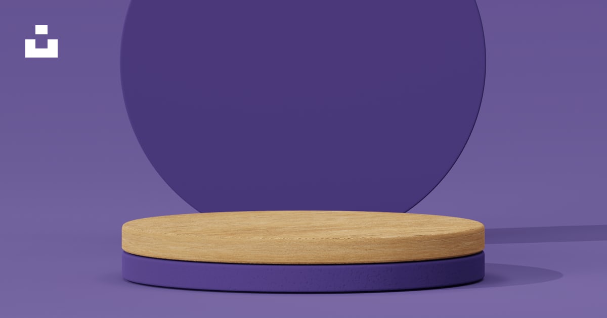 Un objet rond avec une base en bois sur fond violet photo – Image ...