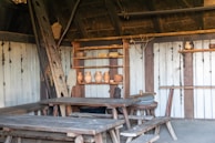 A rustic setting featuring wooden furniture crafted by local artisans.