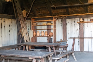 A rustic setting featuring wooden furniture crafted by local artisans.