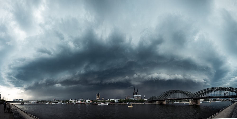 a large storm is coming over a city