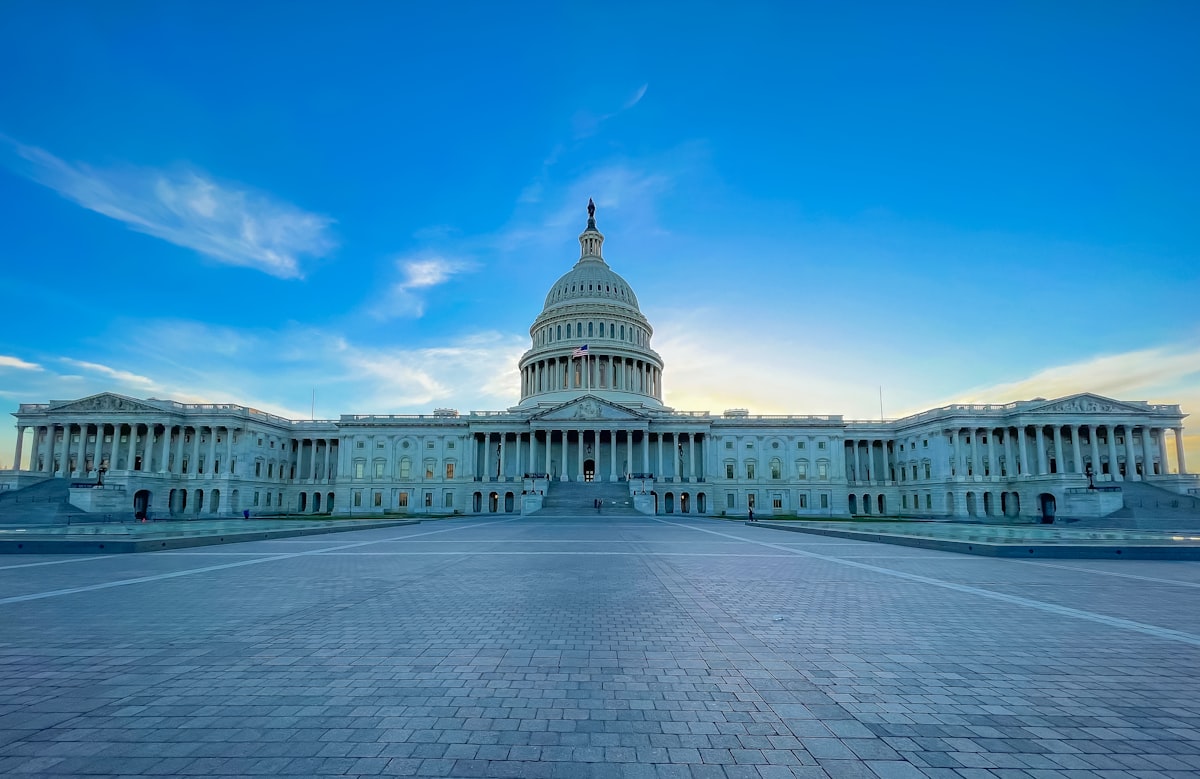 The United States Capitol building in Washington, D.C. under a clear sky