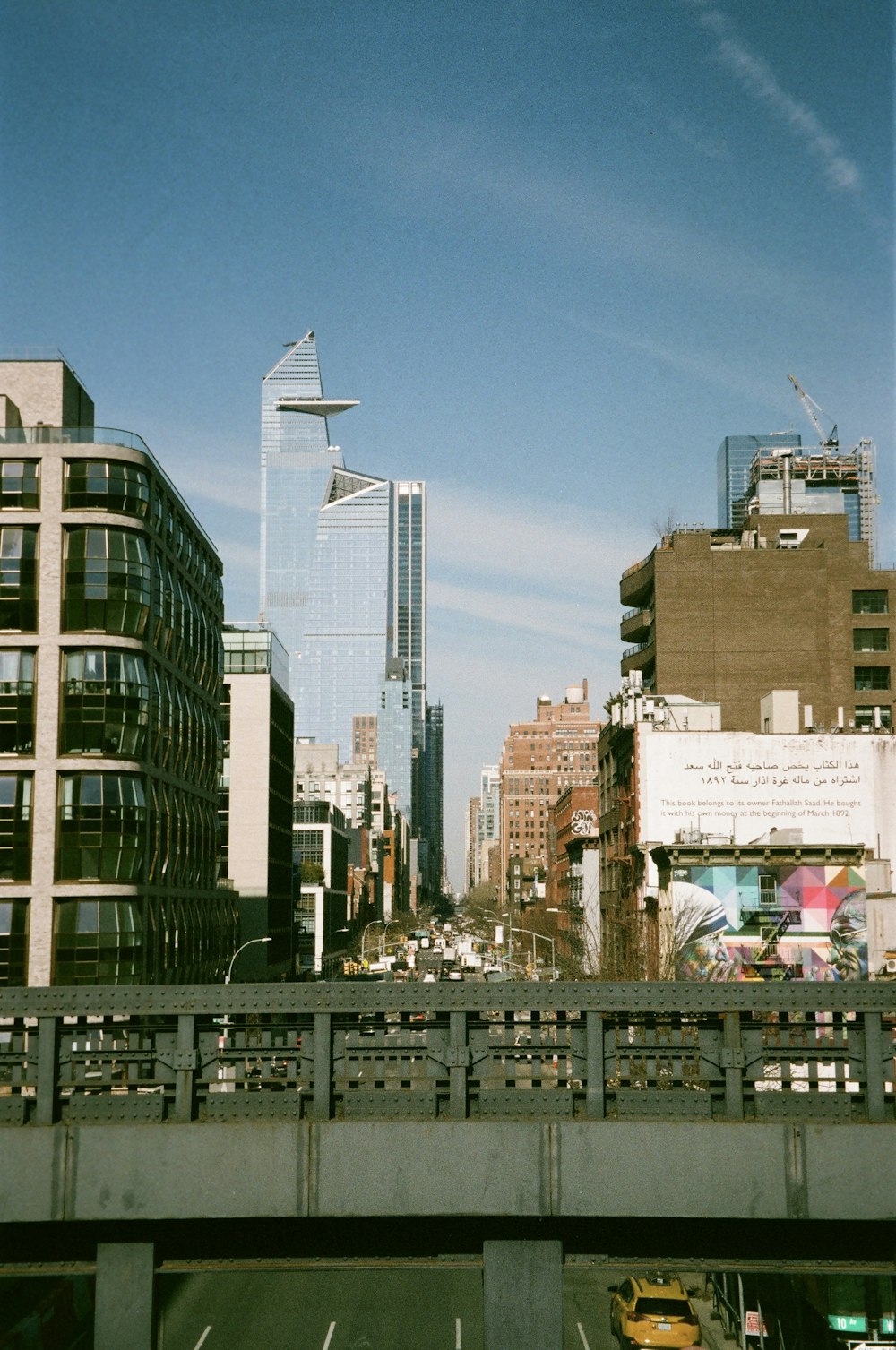 a view of a city from a bridge