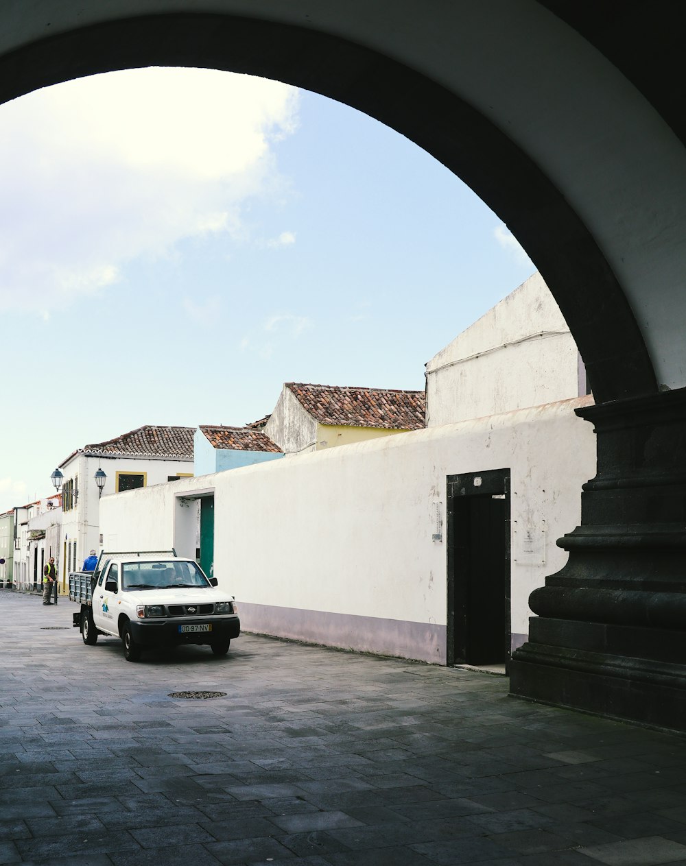 a car is parked in front of a building