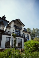 a large white house with lots of windows