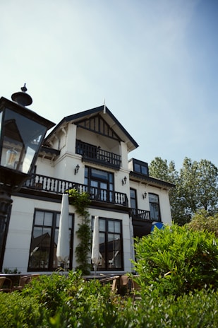 a large white house with lots of windows