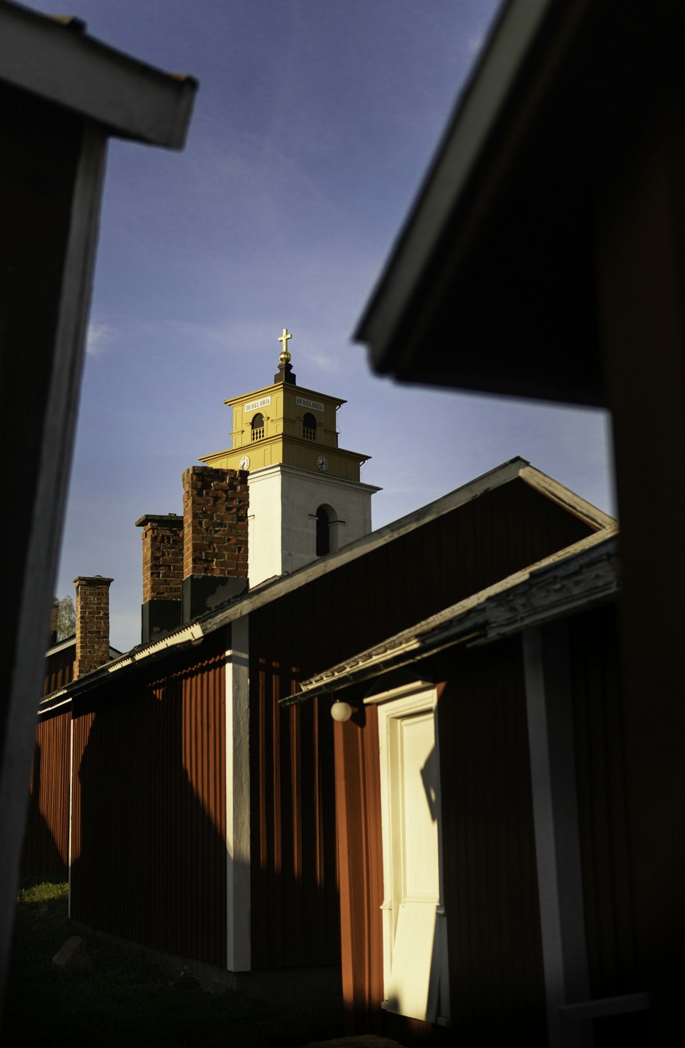 a building with a steeple and a clock tower