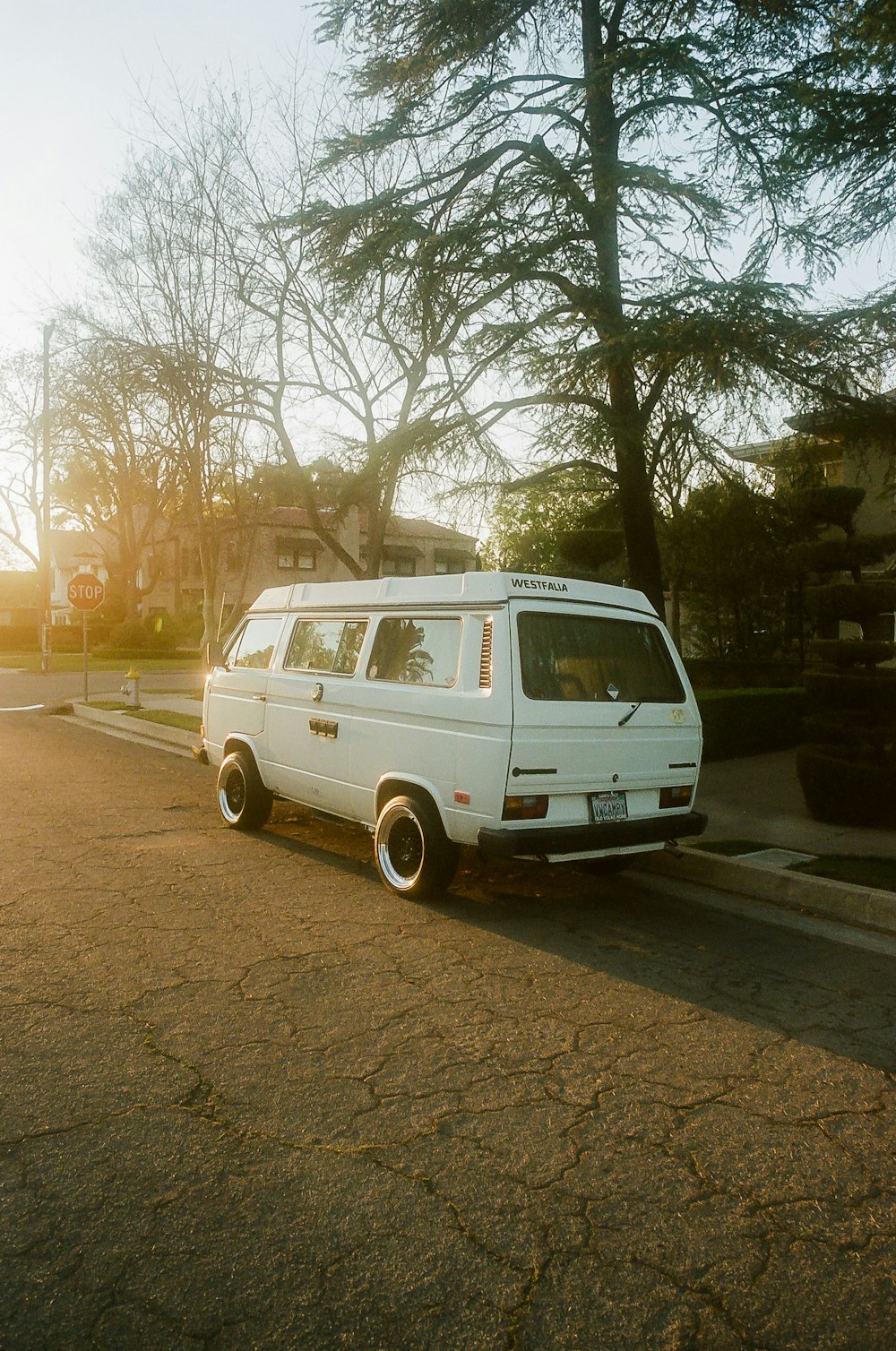 a white van parked on the side of the road