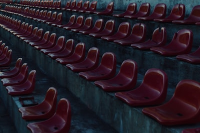 Empty stadium seats reflecting the somber mood after relegation.