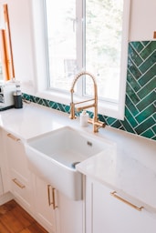 a kitchen with a sink and a window