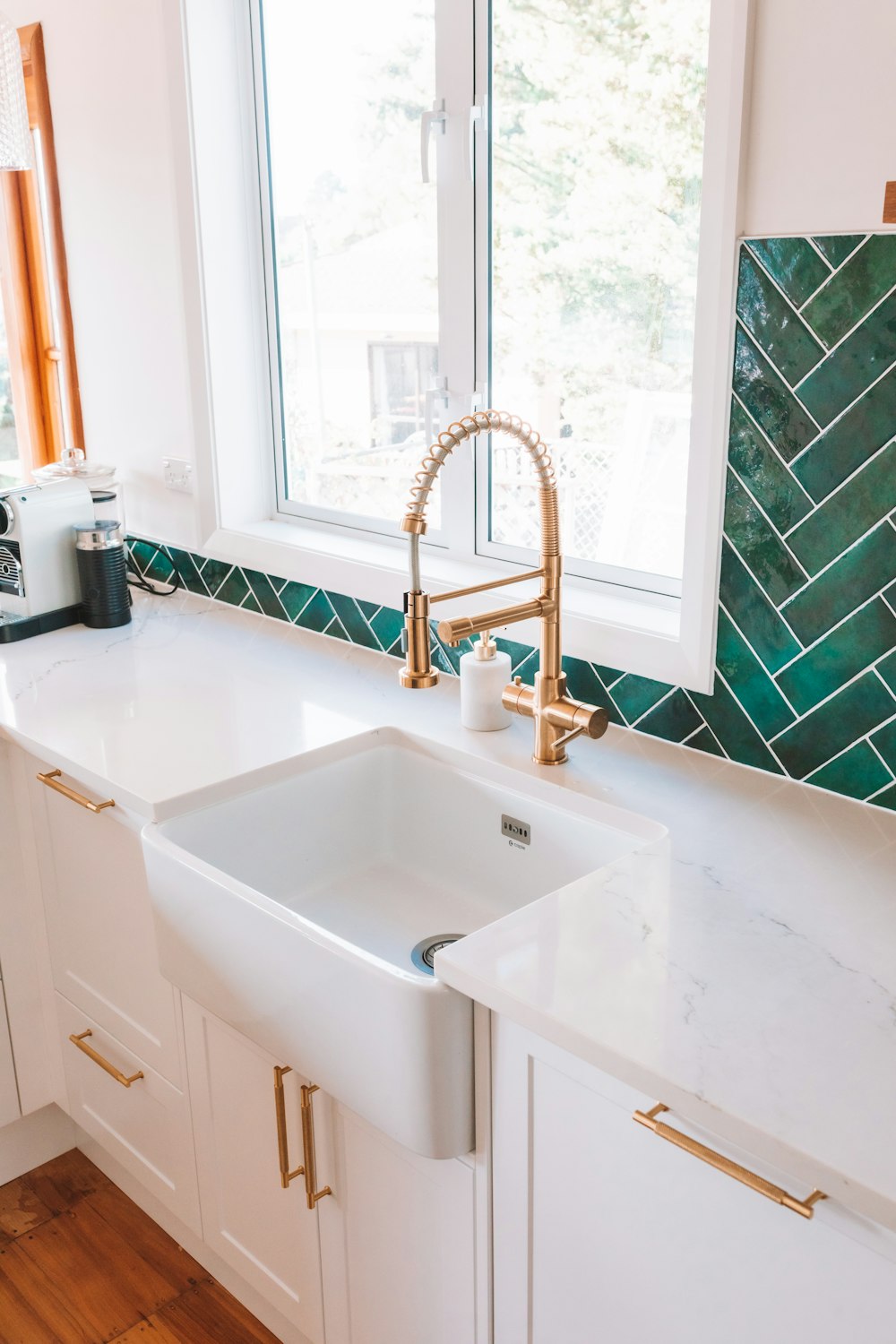 a kitchen with a sink and a window