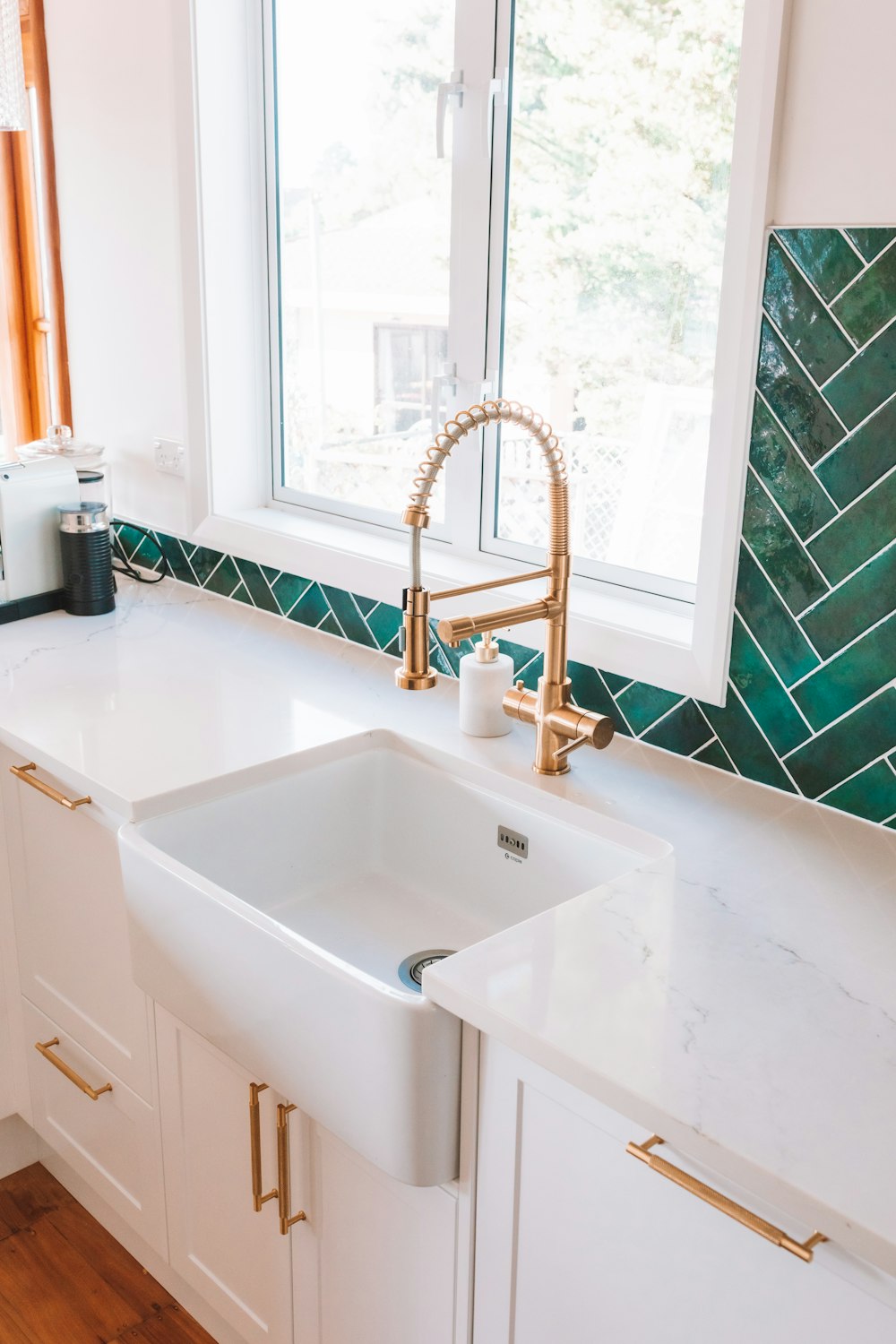 a kitchen with a sink and a window