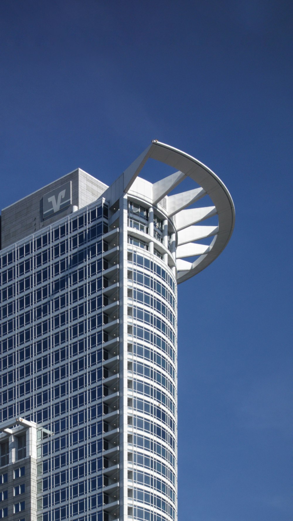 a very tall building with a very tall clock on it's side