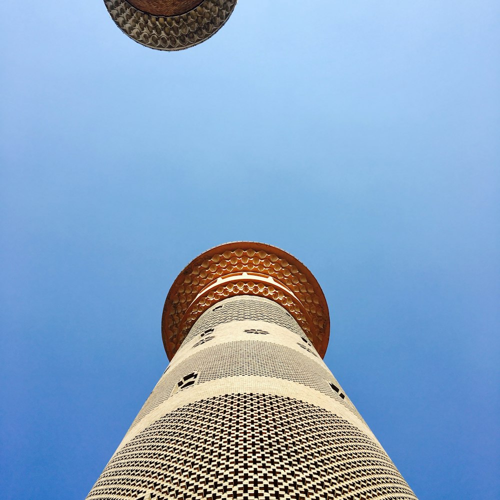 looking up at the top of a tall building