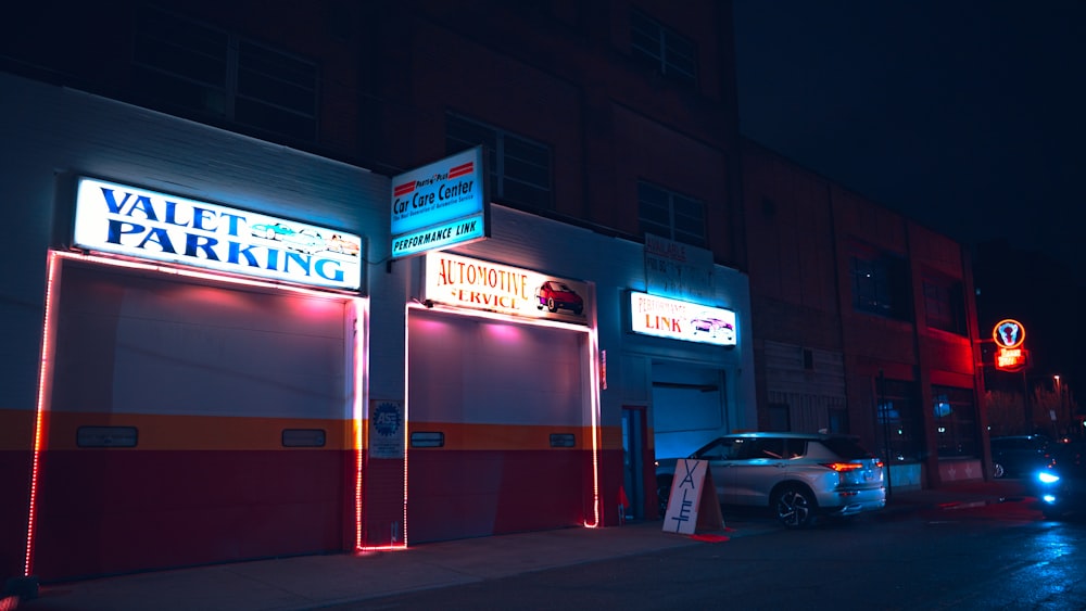 a car parked in front of a parking garage