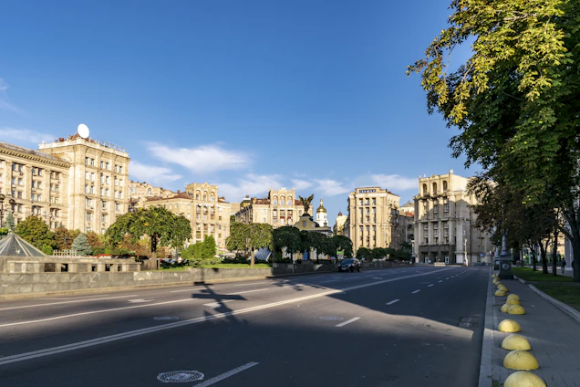 A scenic view of Utica's main street with local buildings and blue skies.