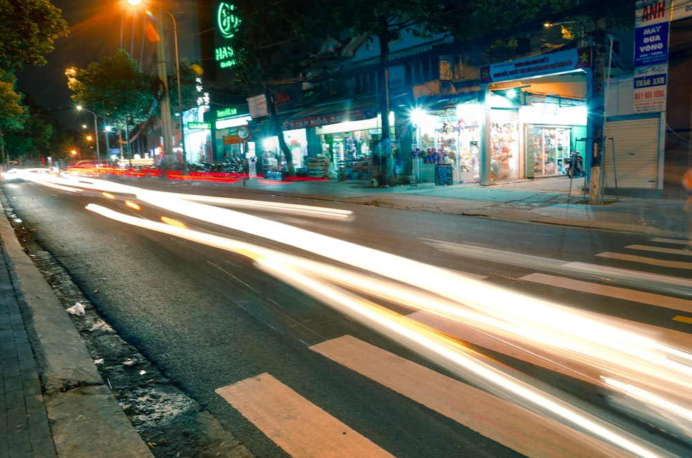 a blurry photo of a city street at night