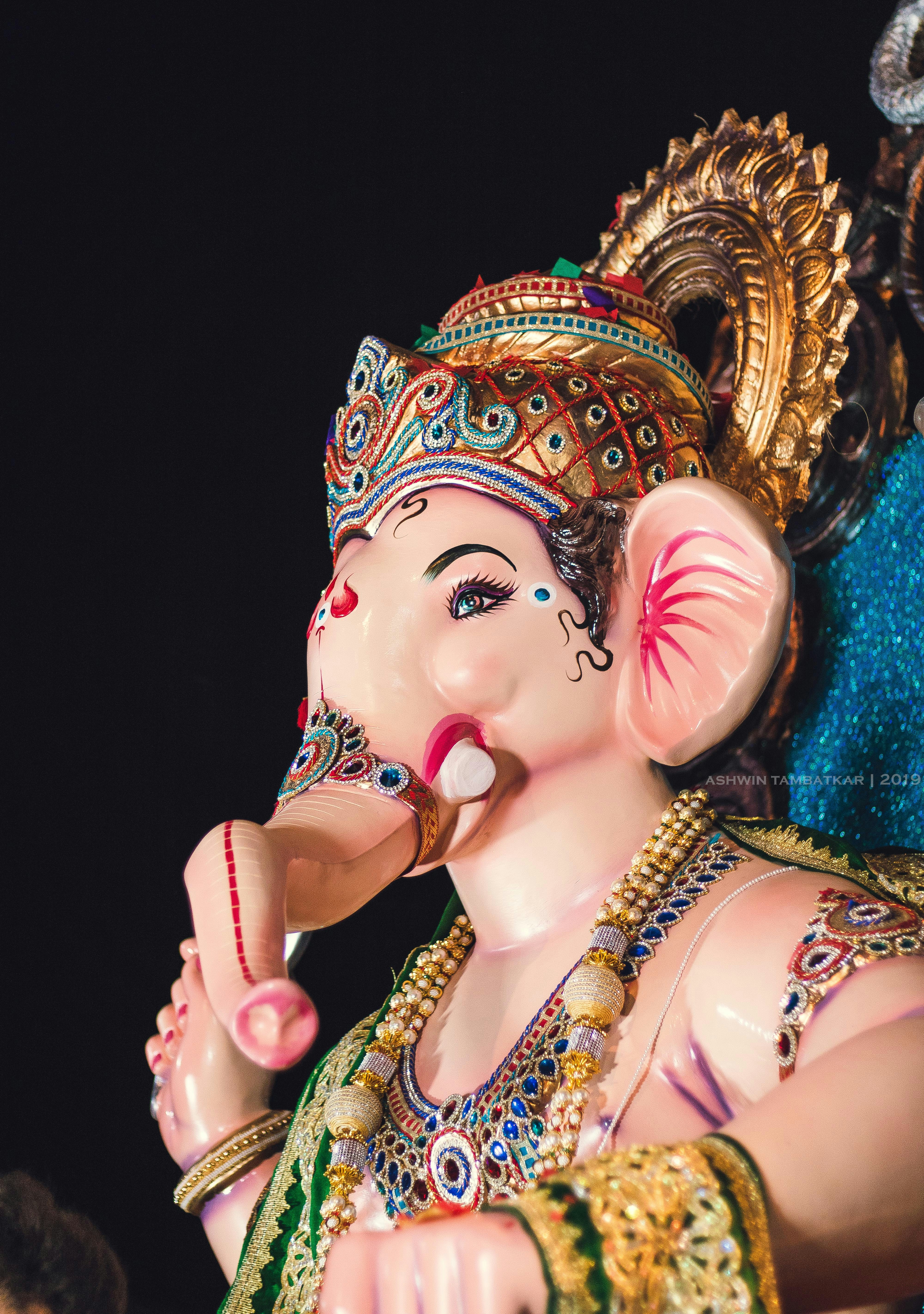 A close up of a statue of an elephant photo – Free Person Image on ...