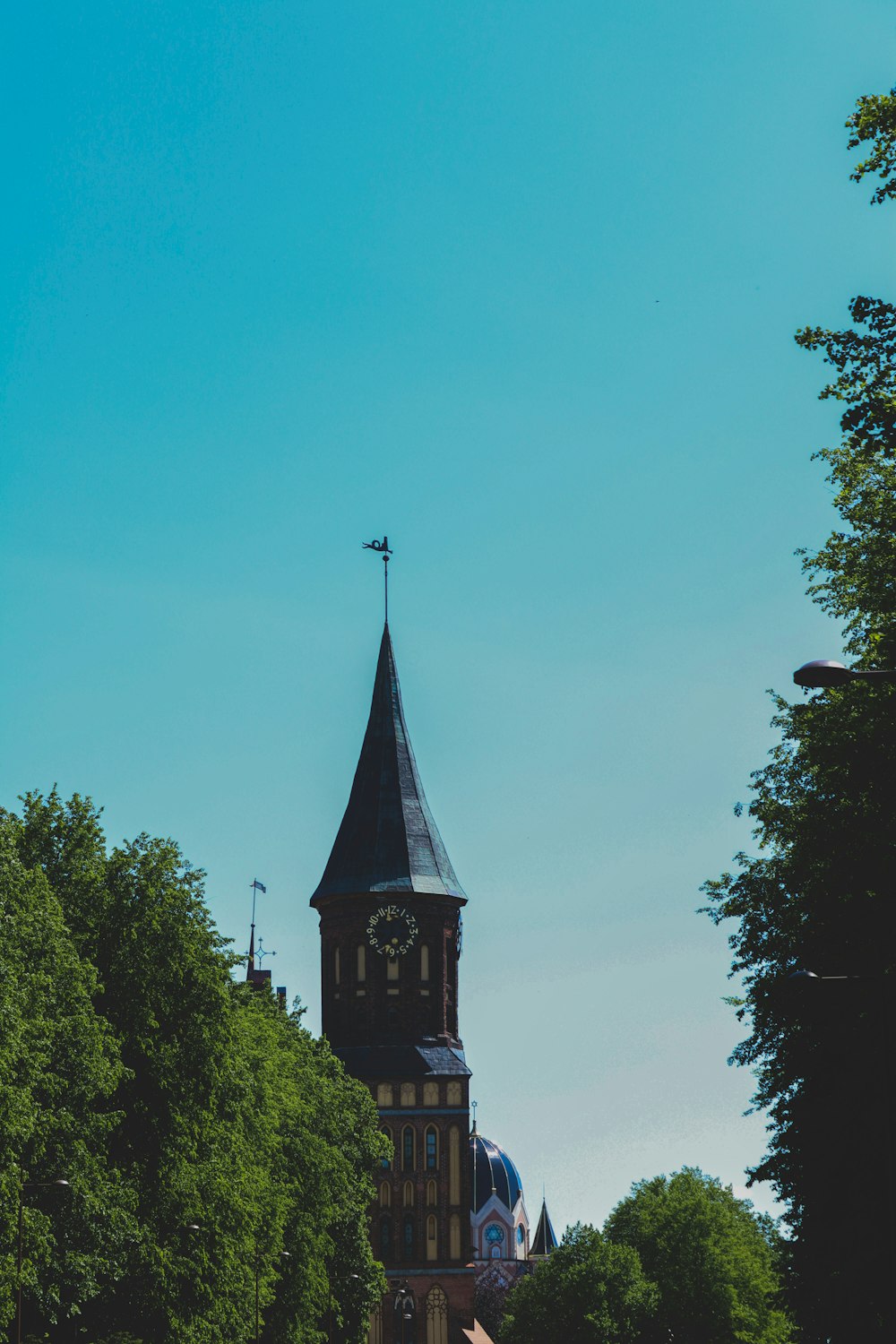 a tall building with a clock on the top of it