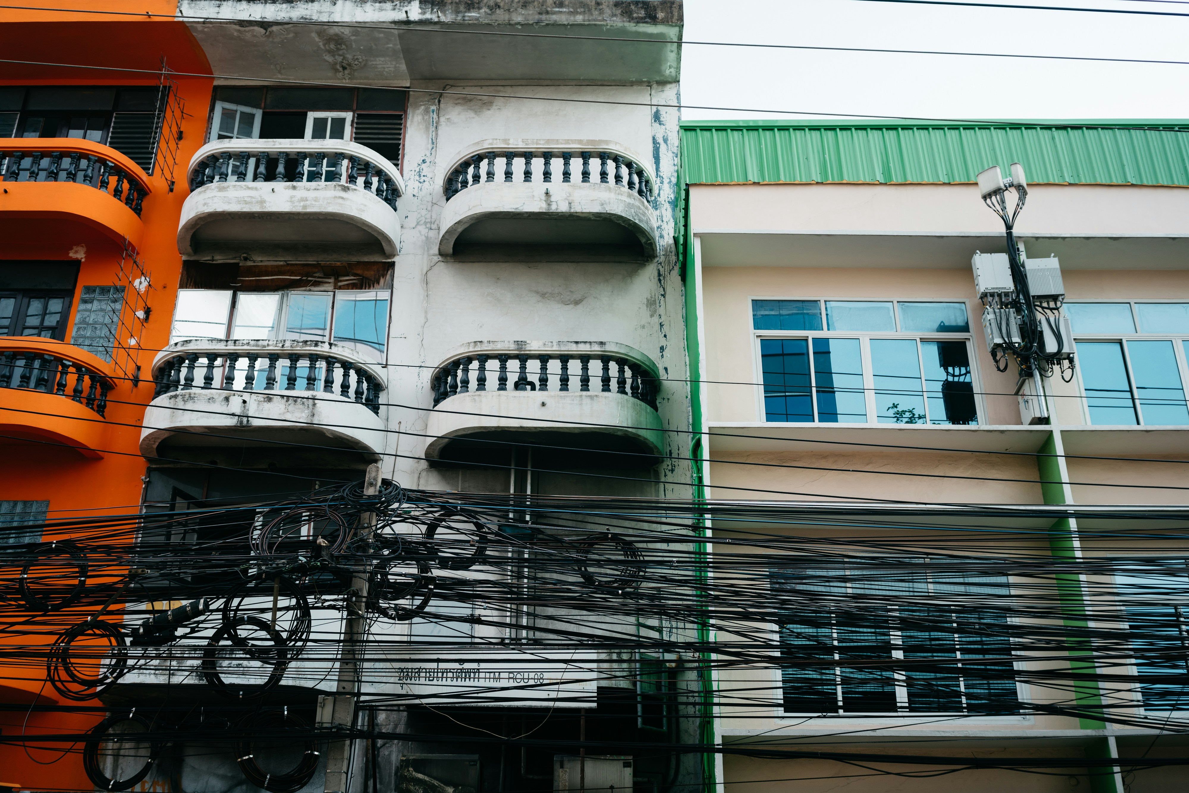 a building with multiple balconies and balconies on it