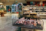 a display case in a store filled with lots of food