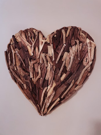 A heart-shaped craft made by children, showcasing their creativity.