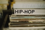 a stack of records sitting on top of a table