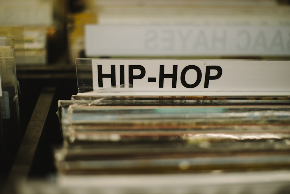 a stack of records sitting on top of a table