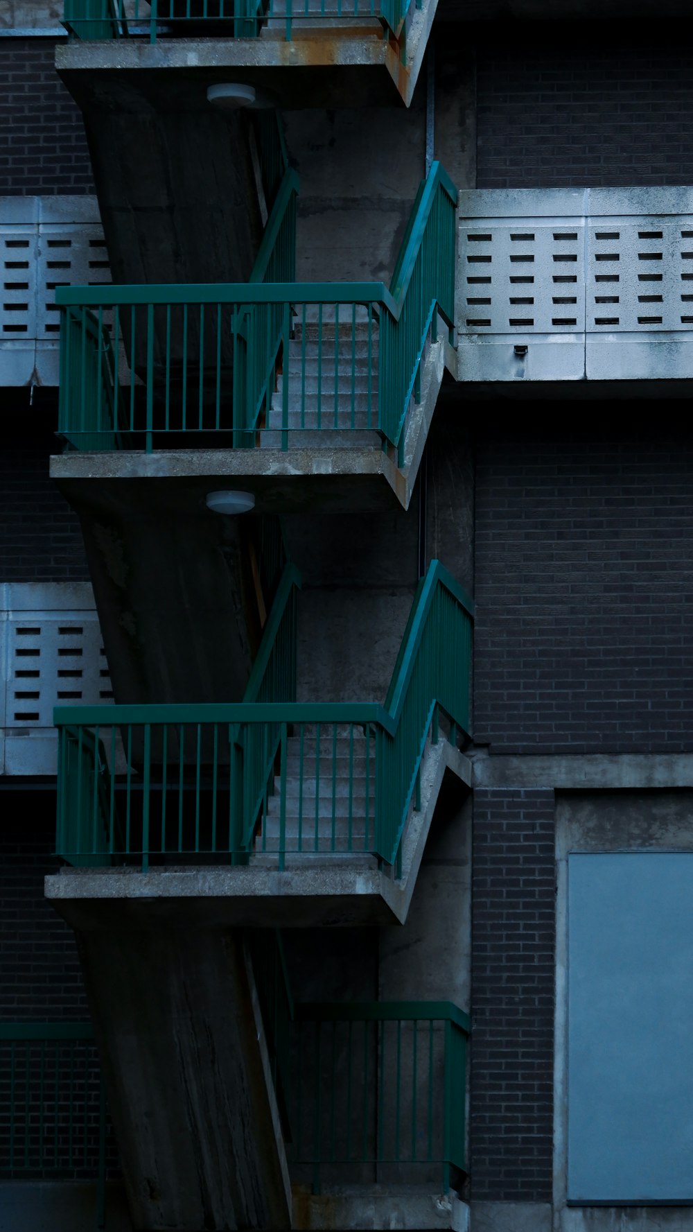 a tall building with balconies and balconies on the balconies