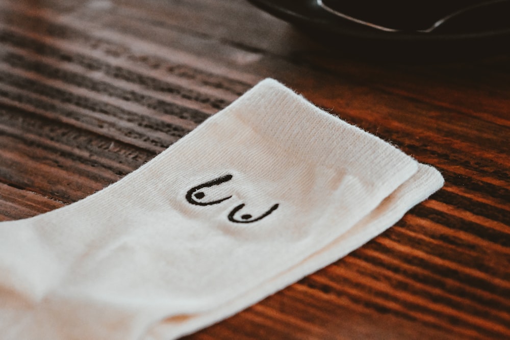 a close up of a napkin on a table