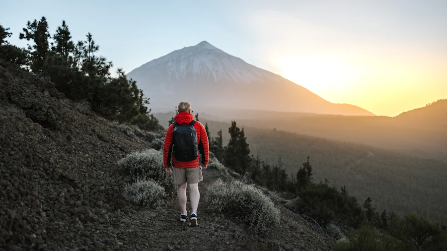 Hiker walking towards Mount Teide