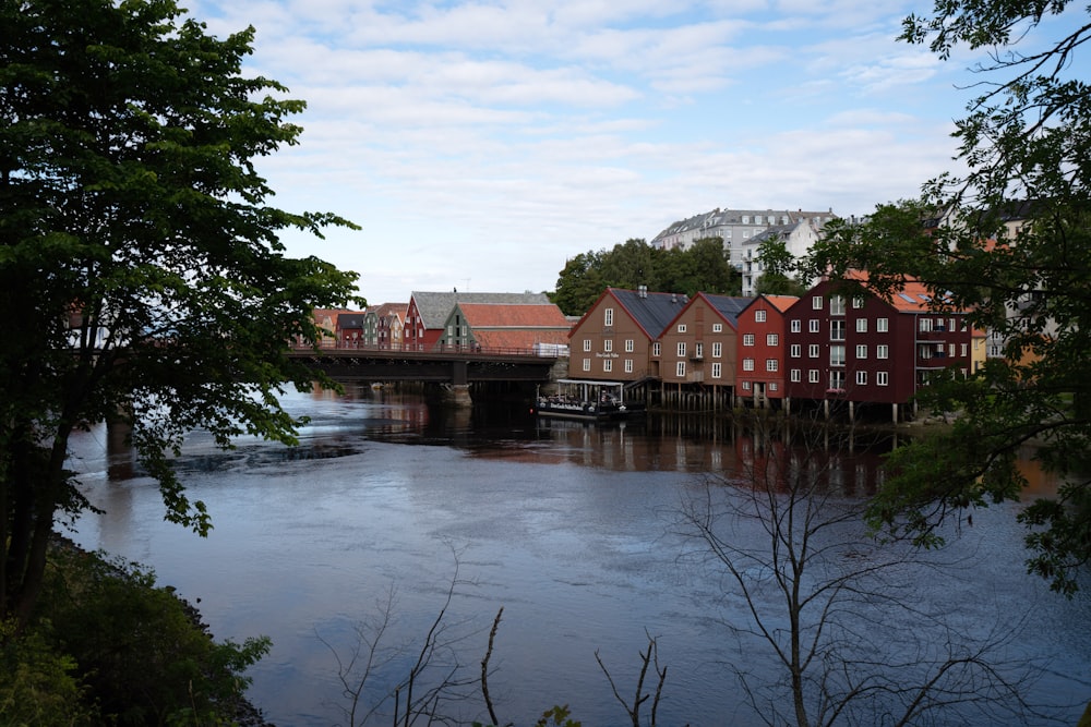 a body of water with a bridge in the background