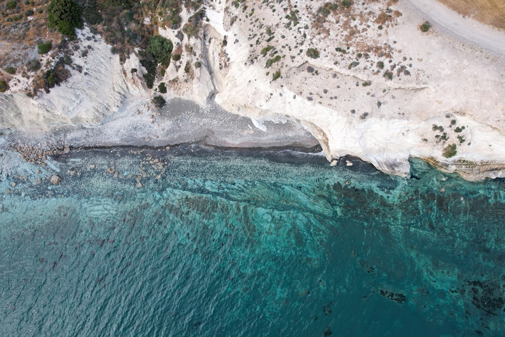 an aerial view of a beach and a body of water