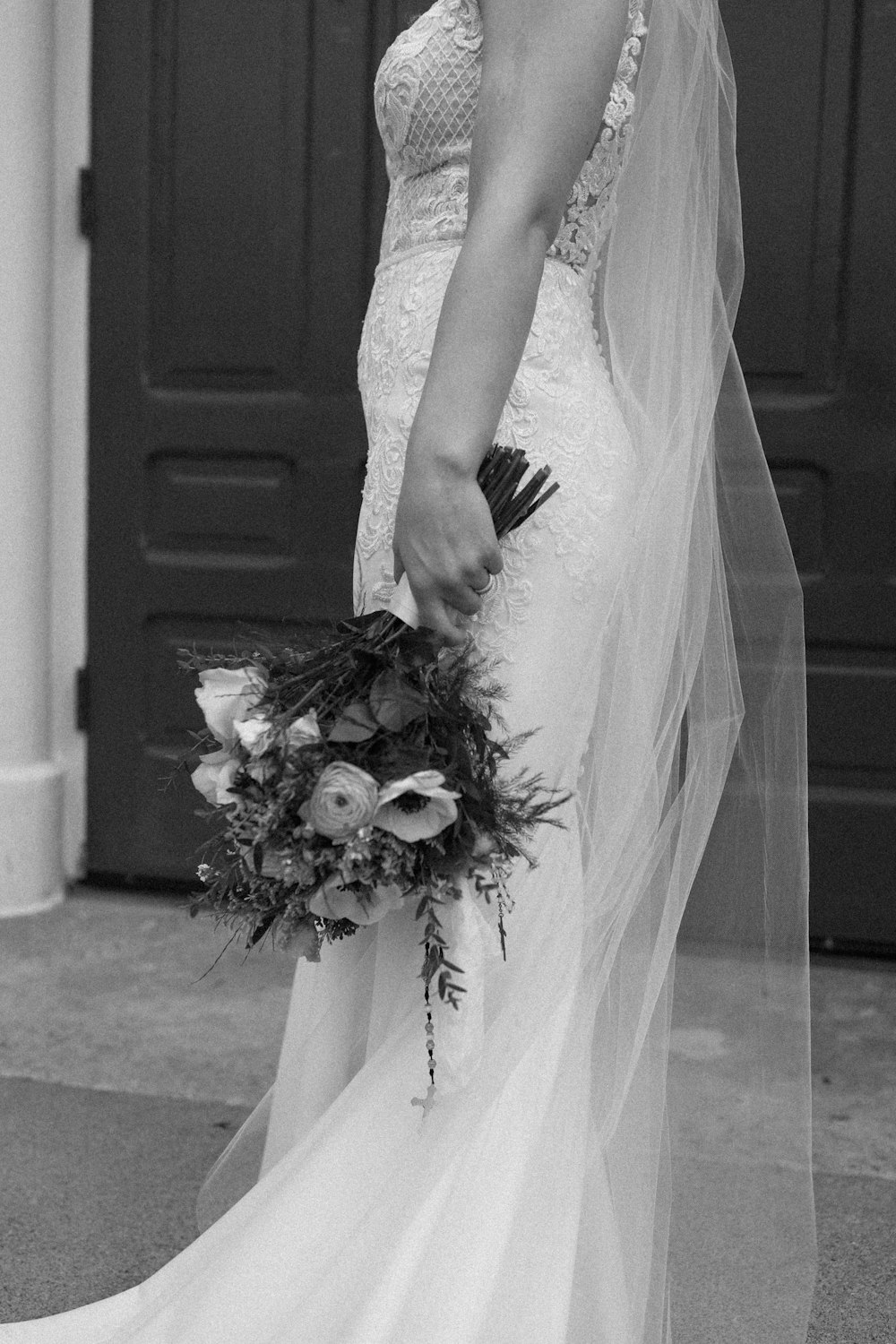 a black and white photo of a bride