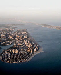 A graph overlay on a coastal city skyline showing rising property prices.