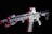 A modern rifle with a sleek design is set against a dark background. The gun features various attachments, including an optical sight on top and a flashlight mounted on the side. Metallic surfaces are highlighted with shades of red, adding contrast and depth to the appearance.