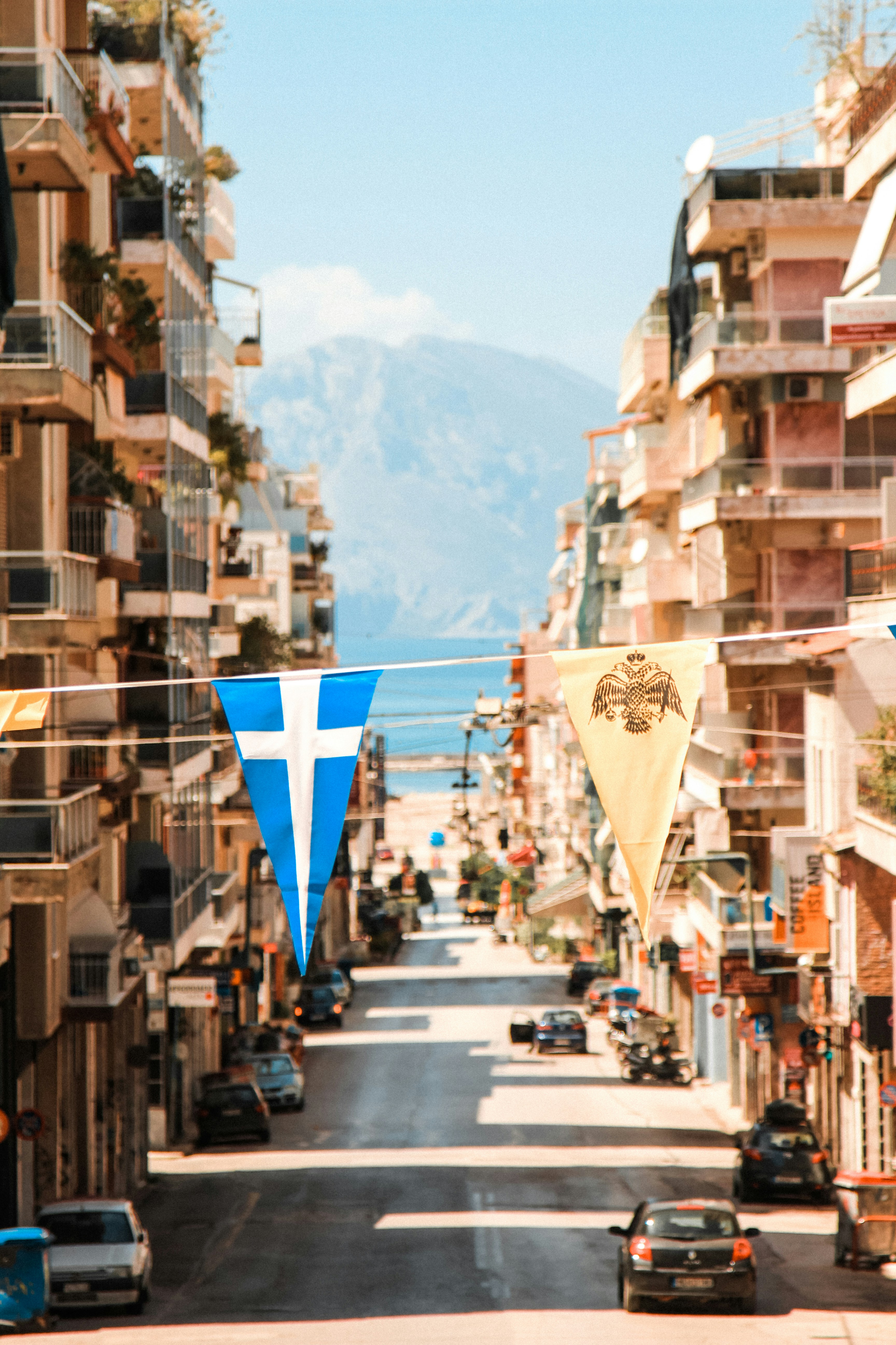 a street with cars parked on both sides of it