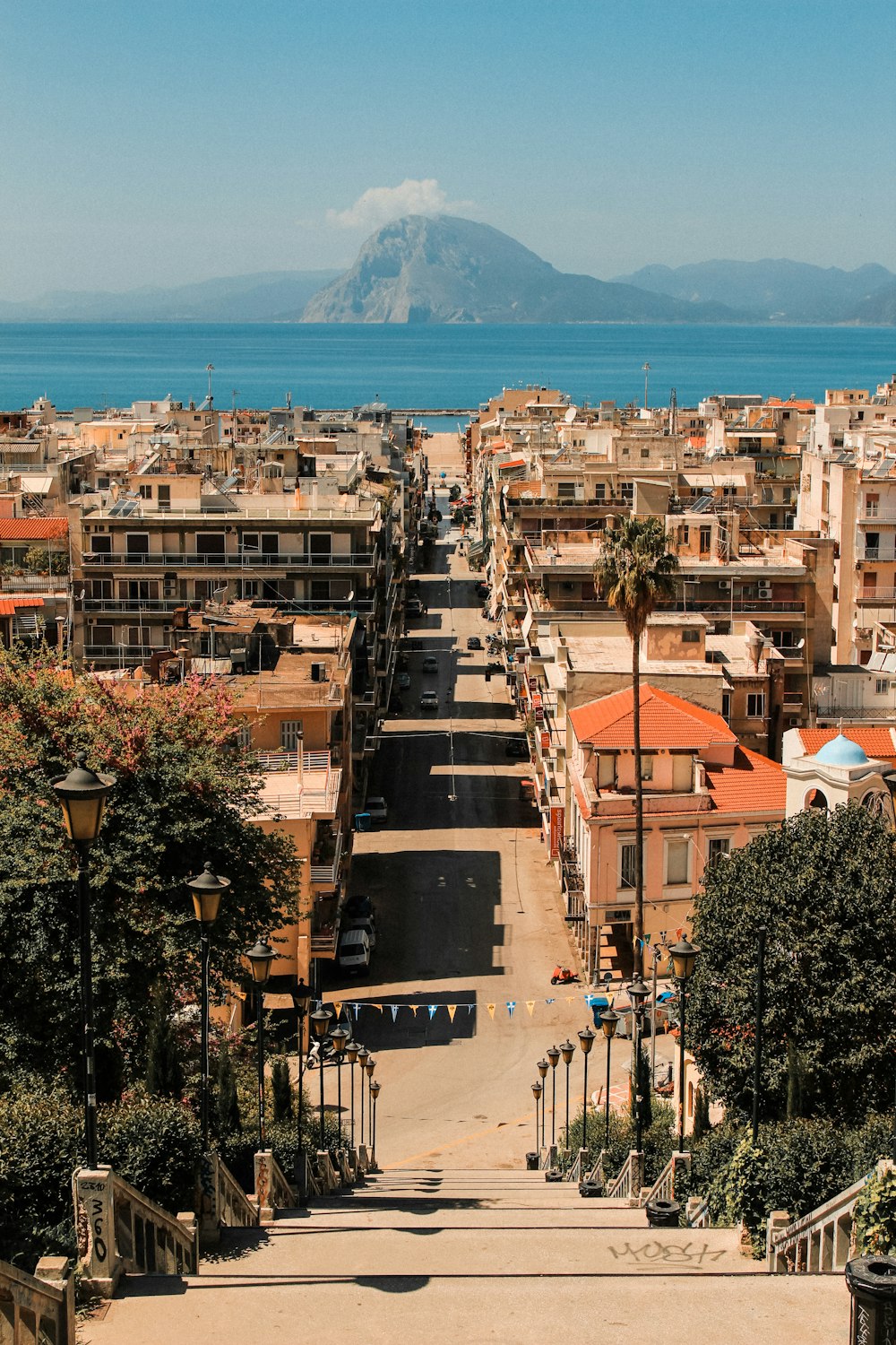 a view of a city with a mountain in the background