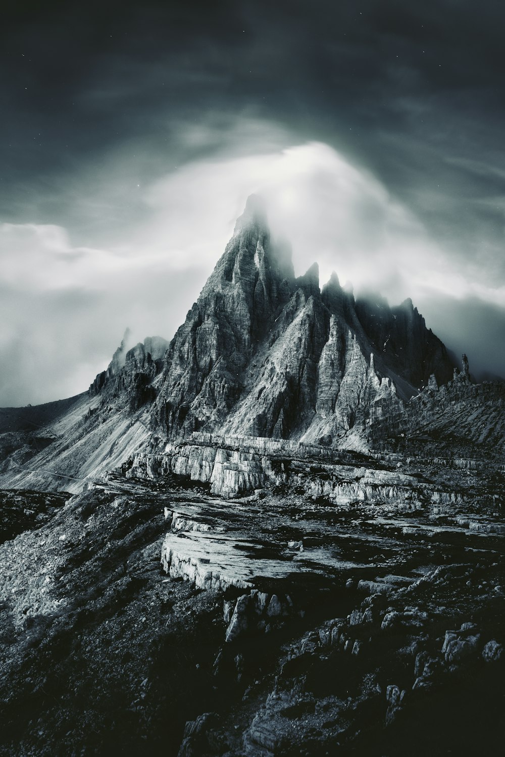 a black and white photo of a mountain